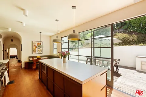 a view of front door with wooden floor