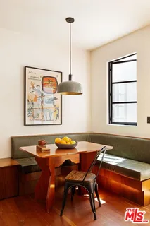 a bathroom with a bathtub and a double vanity sink