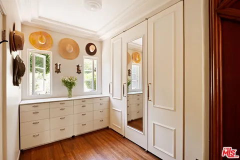 a view of a patio with furniture and backyard