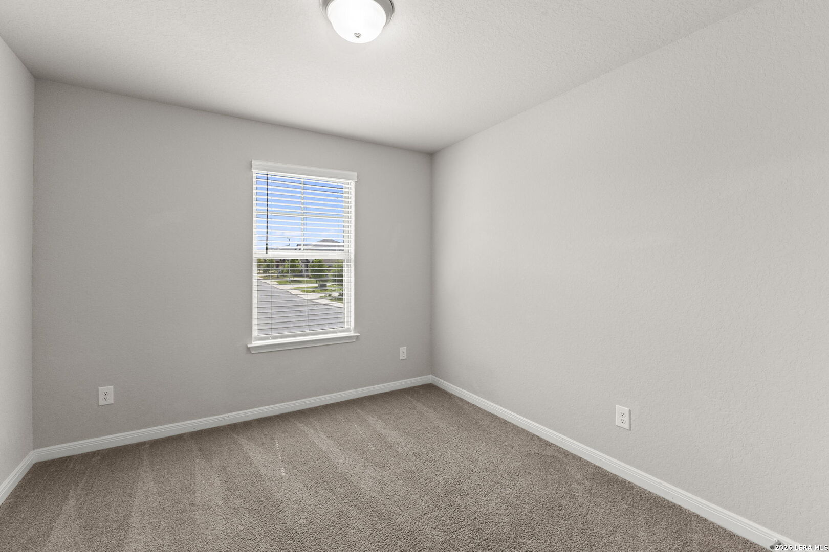 12221 Icon Ridge San Antonio, TX 78253 - Photo 28 of 46 an empty room with a window