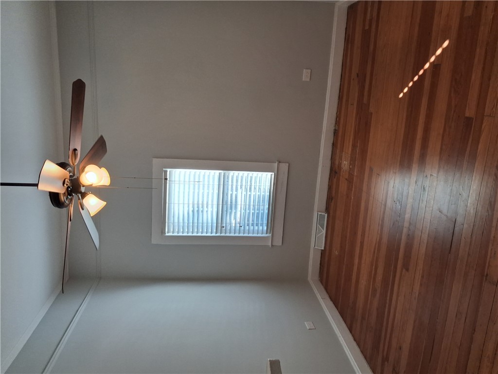 6 Allen Street Pelzer, SC 29669 - Photo 11 of 13 This interior captures the elegant flooring and subtle natural lighting.