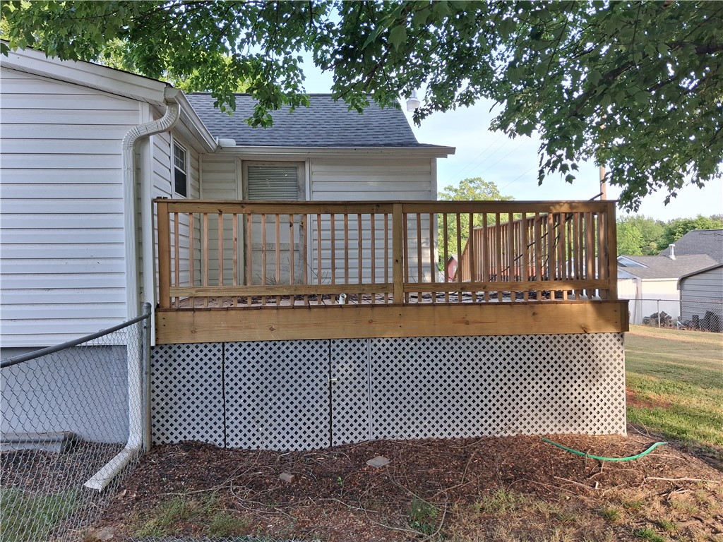 6 Allen Street Pelzer, SC 29669 - Photo 4 of 13 This outdoor space features a wooden deck, perfect for enjoying the surroundings.