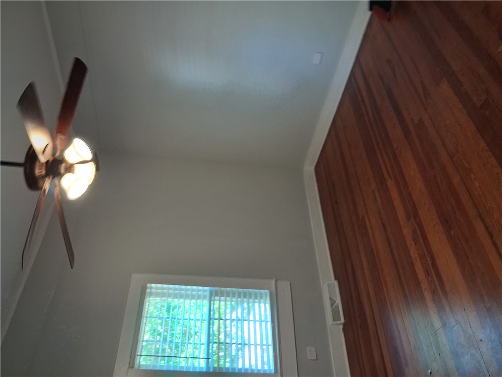 6 Allen Street Pelzer, SC 29669 - Photo 10 of 13 This inviting space features classic hardwood floors and abundant natural light.