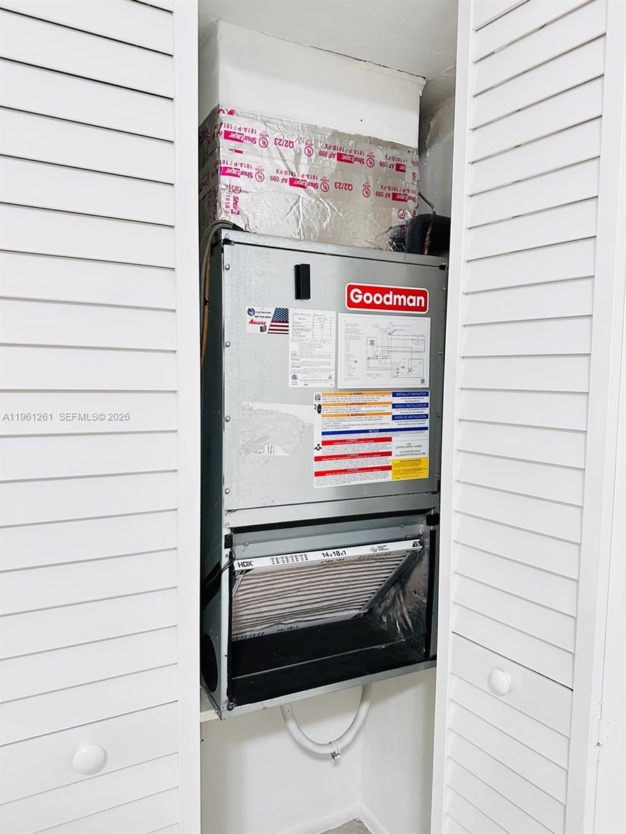 3490 Foxcroft Road, Unit B208 Miramar, FL 33025 - Photo 26 of 32 a utility room with dryer and washer