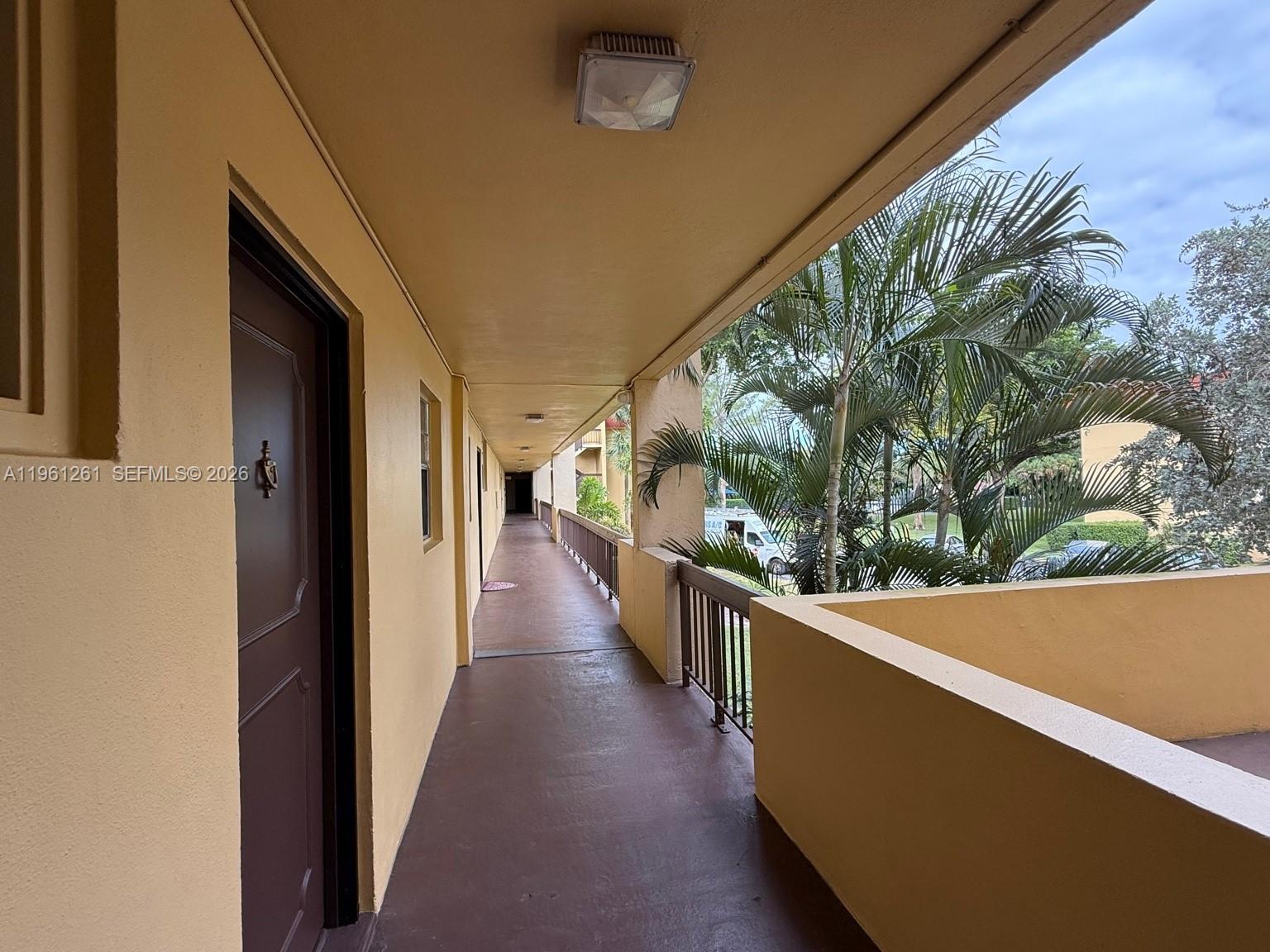 3490 Foxcroft Road, Unit B208 Miramar, FL 33025 - Photo 3 of 32 a view of a balcony