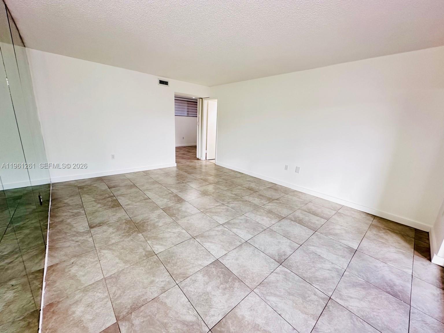 3490 Foxcroft Road, Unit B208 Miramar, FL 33025 - Photo 8 of 32 a view of an empty room