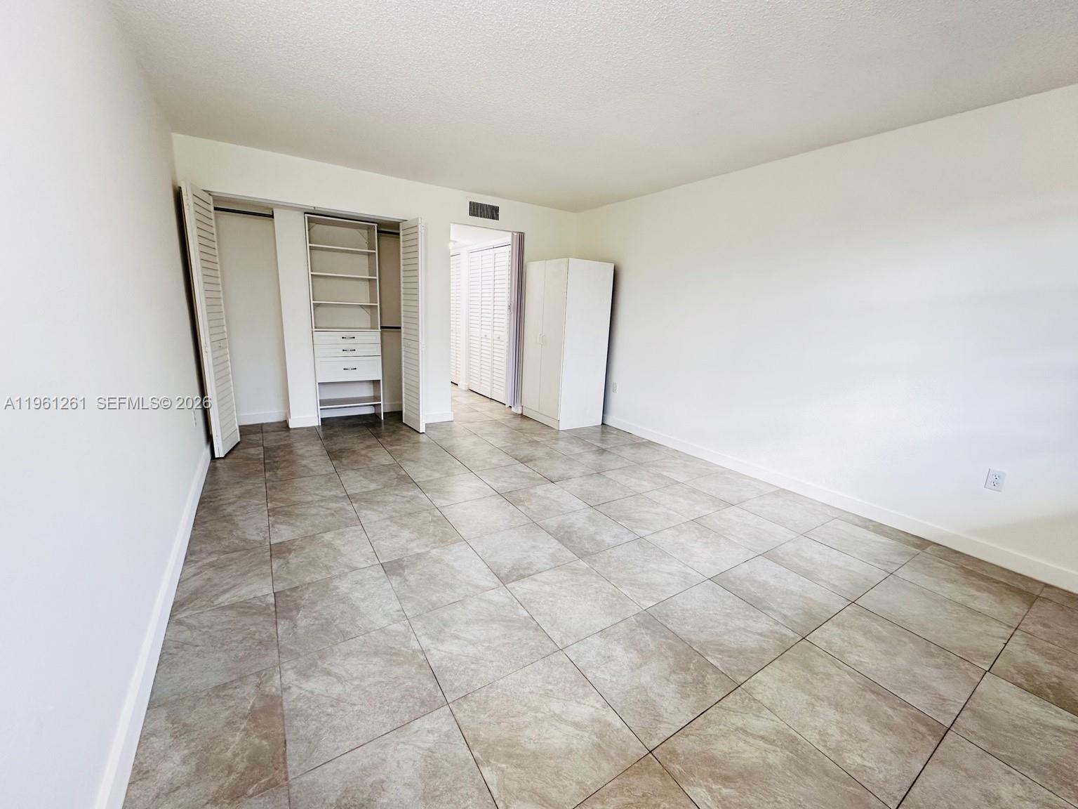 3490 Foxcroft Road, Unit B208 Miramar, FL 33025 - Photo 9 of 32 a view of an empty room