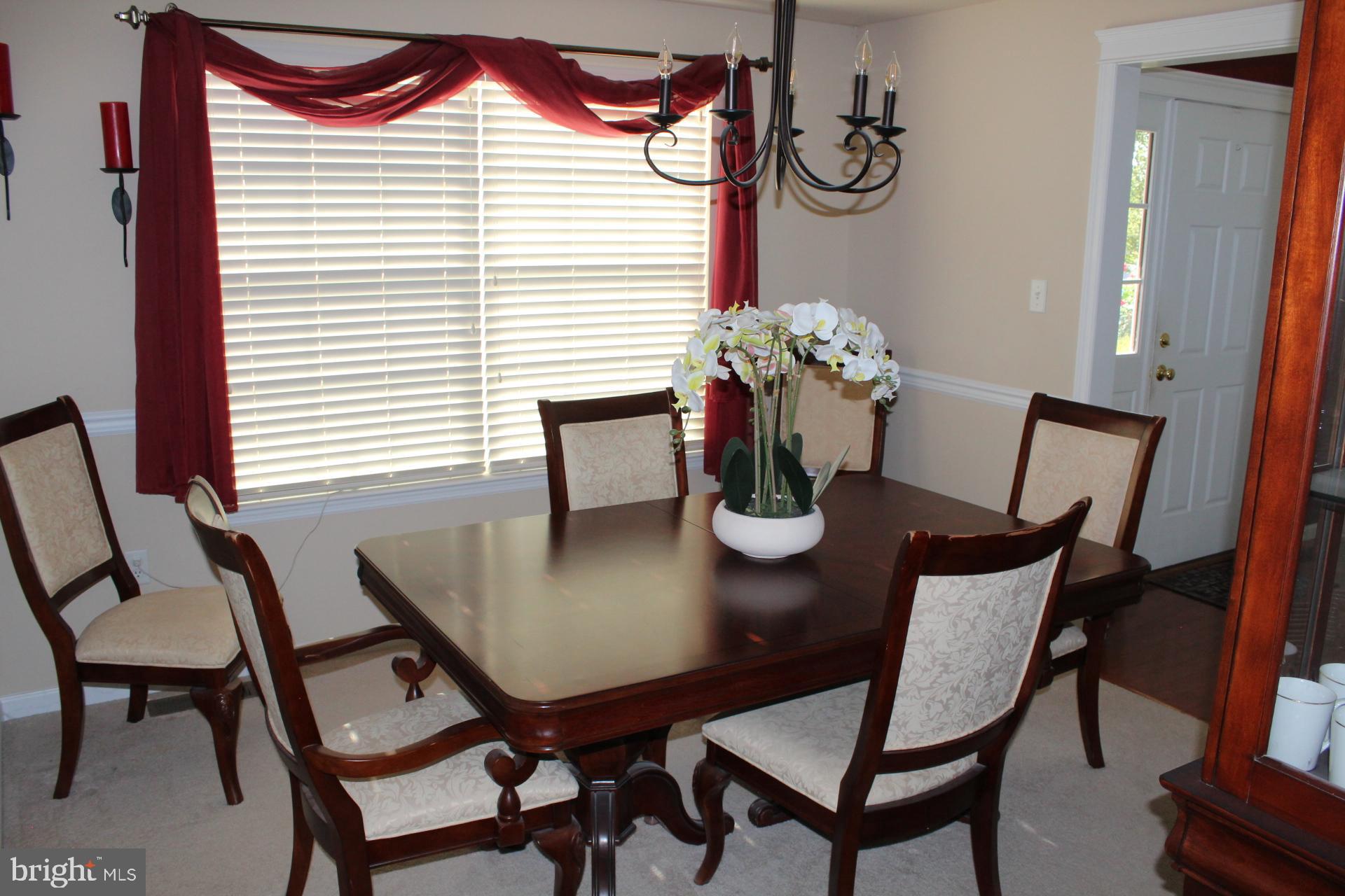 2 Jennifer Court Reading, PA 19608 - Photo 18 of 45 a dining room with furniture and wooden floor