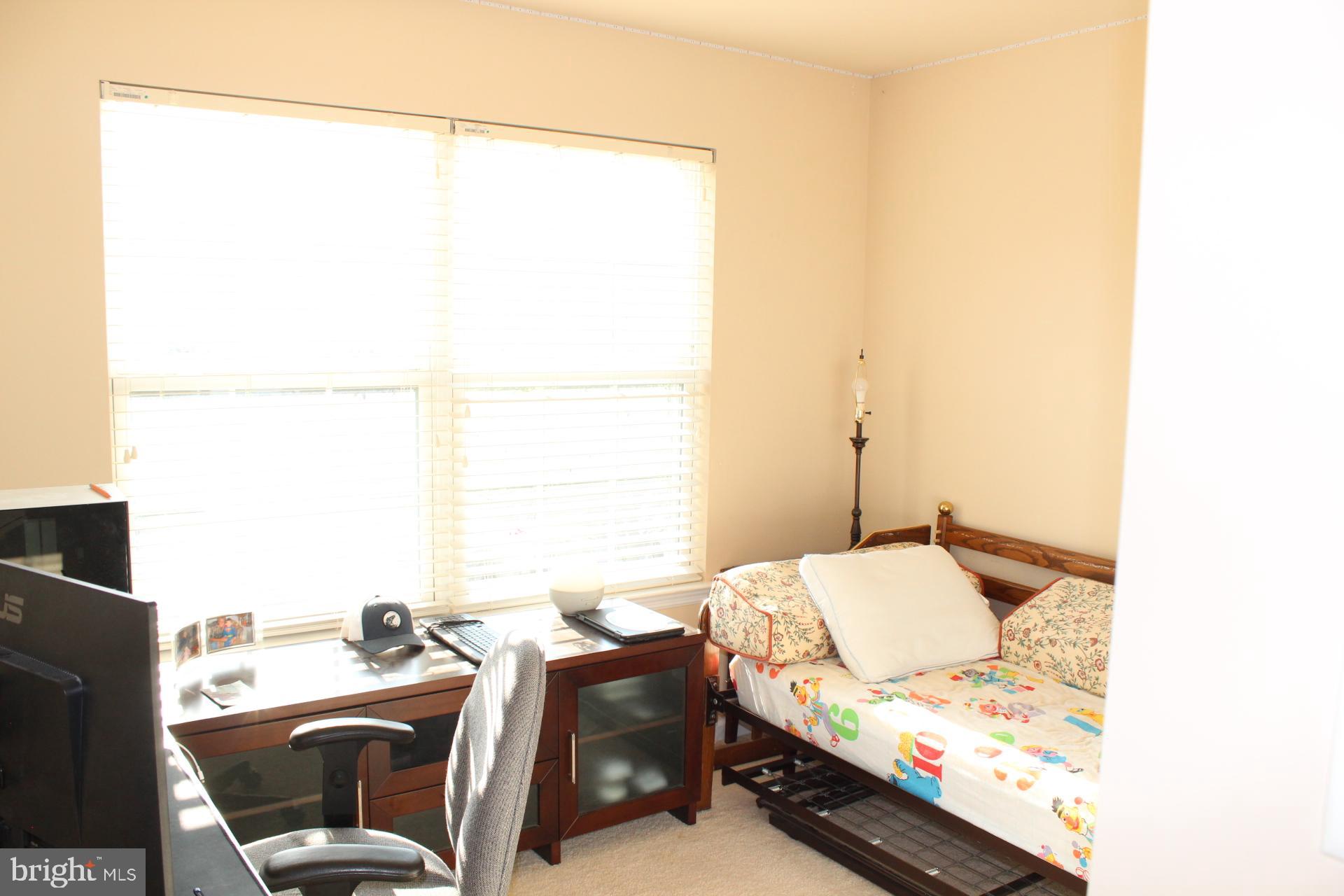 2 Jennifer Court Reading, PA 19608 - Photo 33 of 45 a bedroom with a bed and a window