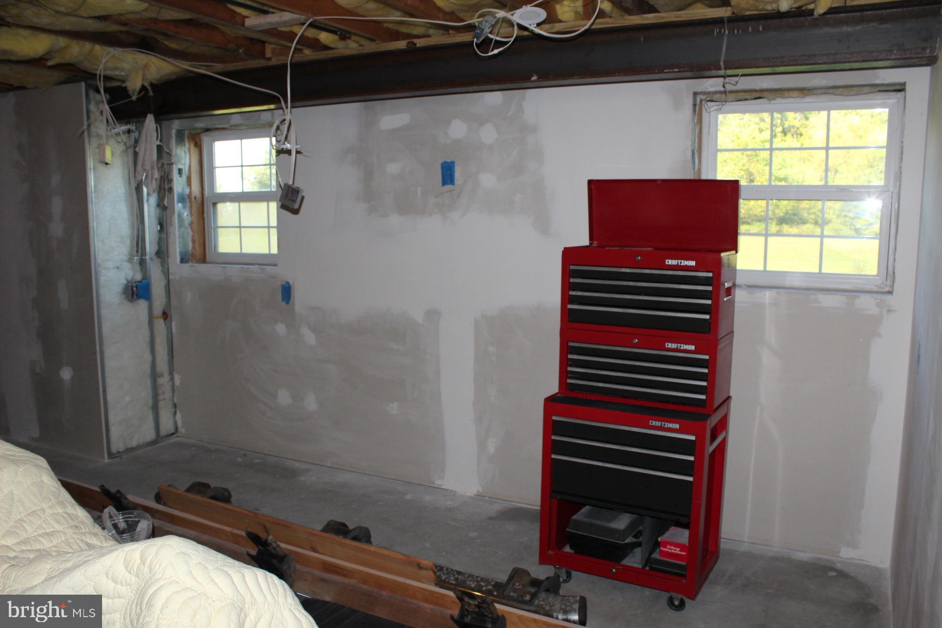 2 Jennifer Court Reading, PA 19608 - Photo 39 of 45 a room with a fireplace and a window