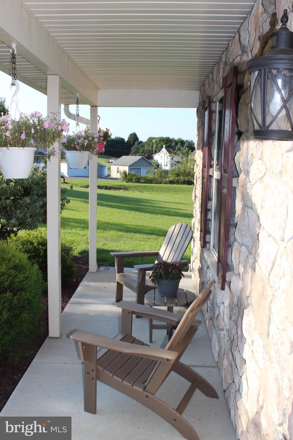 2 Jennifer Court Reading, PA 19608 - Photo 6 of 45 a view of a patio with table and chairs potted plants with the view of lake view