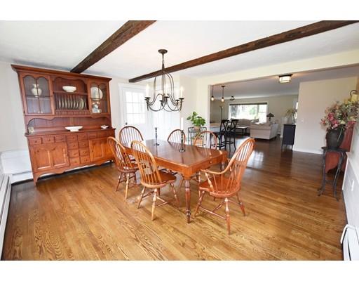 306 Bolton Road Lancaster, MA 01523 - Photo 11 of 30 a dining room with furniture and wooden floor