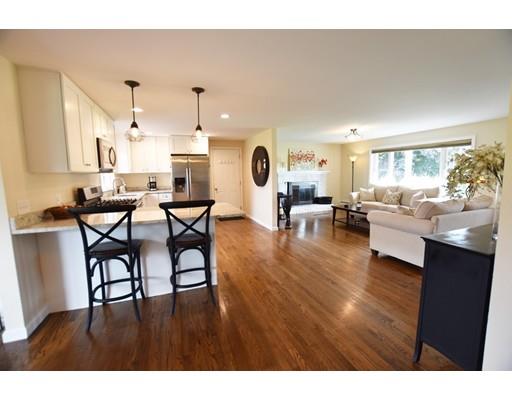 306 Bolton Road Lancaster, MA 01523 - Photo 13 of 30 a living room with furniture and a wooden floor