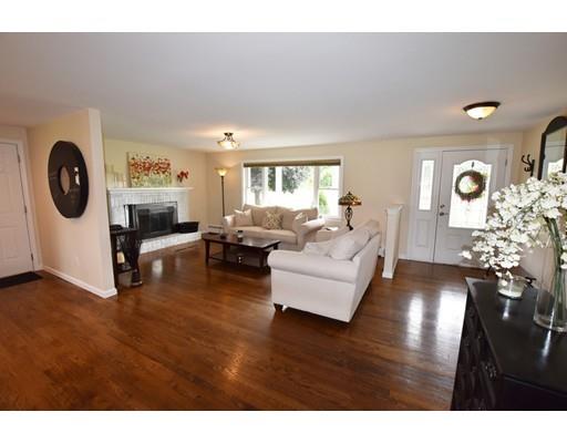 306 Bolton Road Lancaster, MA 01523 - Photo 14 of 30 a living room with furniture and a large window