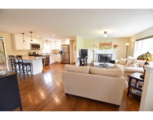 306 Bolton Road Lancaster, MA 01523 - Photo 15 of 30 a living room with furniture and a flat screen tv