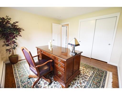 306 Bolton Road Lancaster, MA 01523 - Photo 27 of 30 a living room with furniture and a potted plant