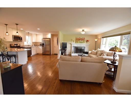 306 Bolton Road Lancaster, MA 01523 - Photo 3 of 30 a living room with furniture and a flat screen tv