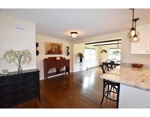 306 Bolton Road Lancaster, MA 01523 - Photo 6 of 30 a living room with furniture and a wooden floor