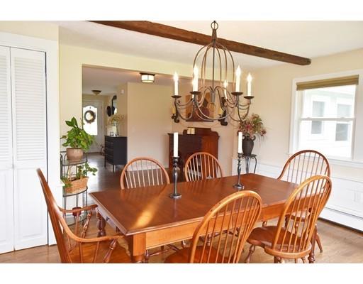 306 Bolton Road Lancaster, MA 01523 - Photo 8 of 30 a view of a dining room with furniture