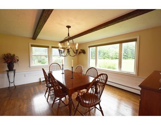 306 Bolton Road Lancaster, MA 01523 - Photo 10 of 30 a view of a dining room with furniture and window