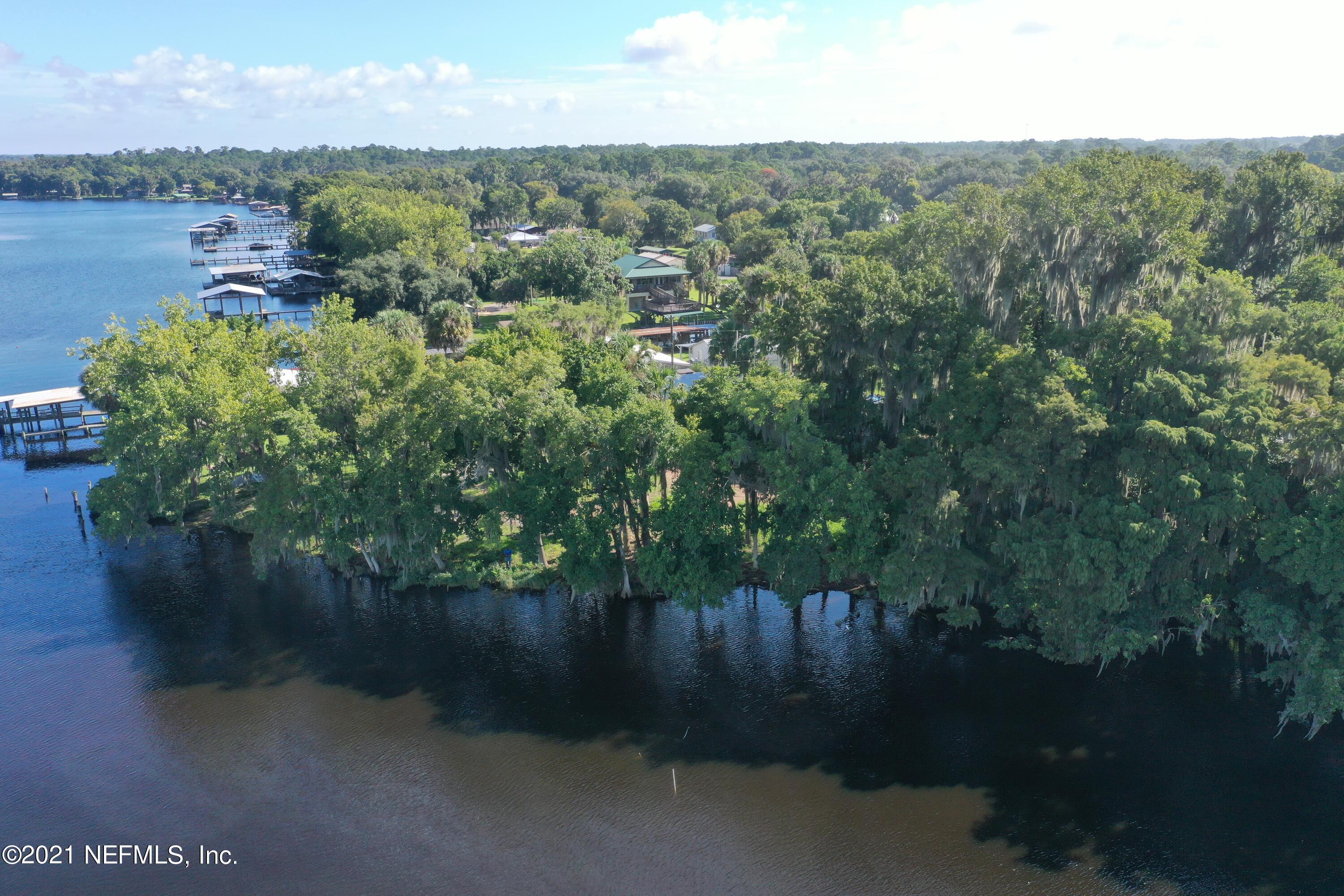 0 Wooten Rd Crescent Crescent City, FL 32112 - Photo 15 of 26 an aerial view of residential house with outdoor space and lake view