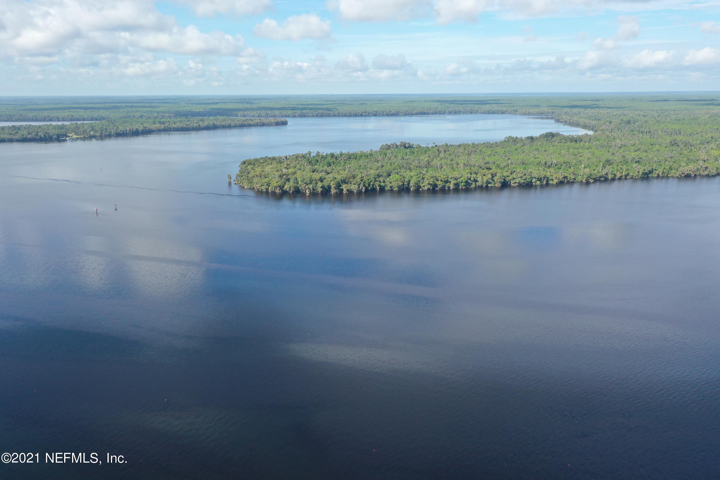 0 Wooten Rd Crescent Crescent City, FL 32112 - Photo 21 of 26 a view of a lake and mountain in the back