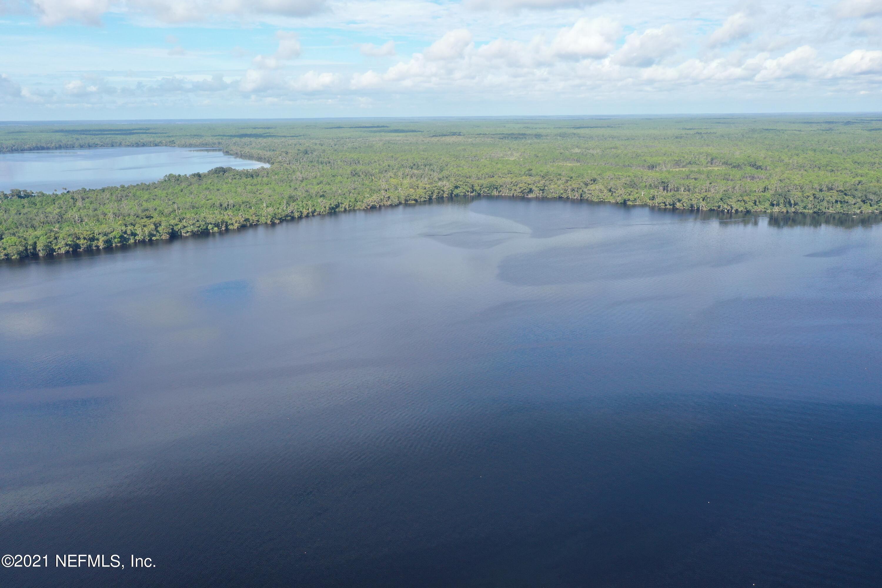 0 Wooten Rd Crescent Crescent City, FL 32112 - Photo 22 of 26 a view of a lake with a big yard