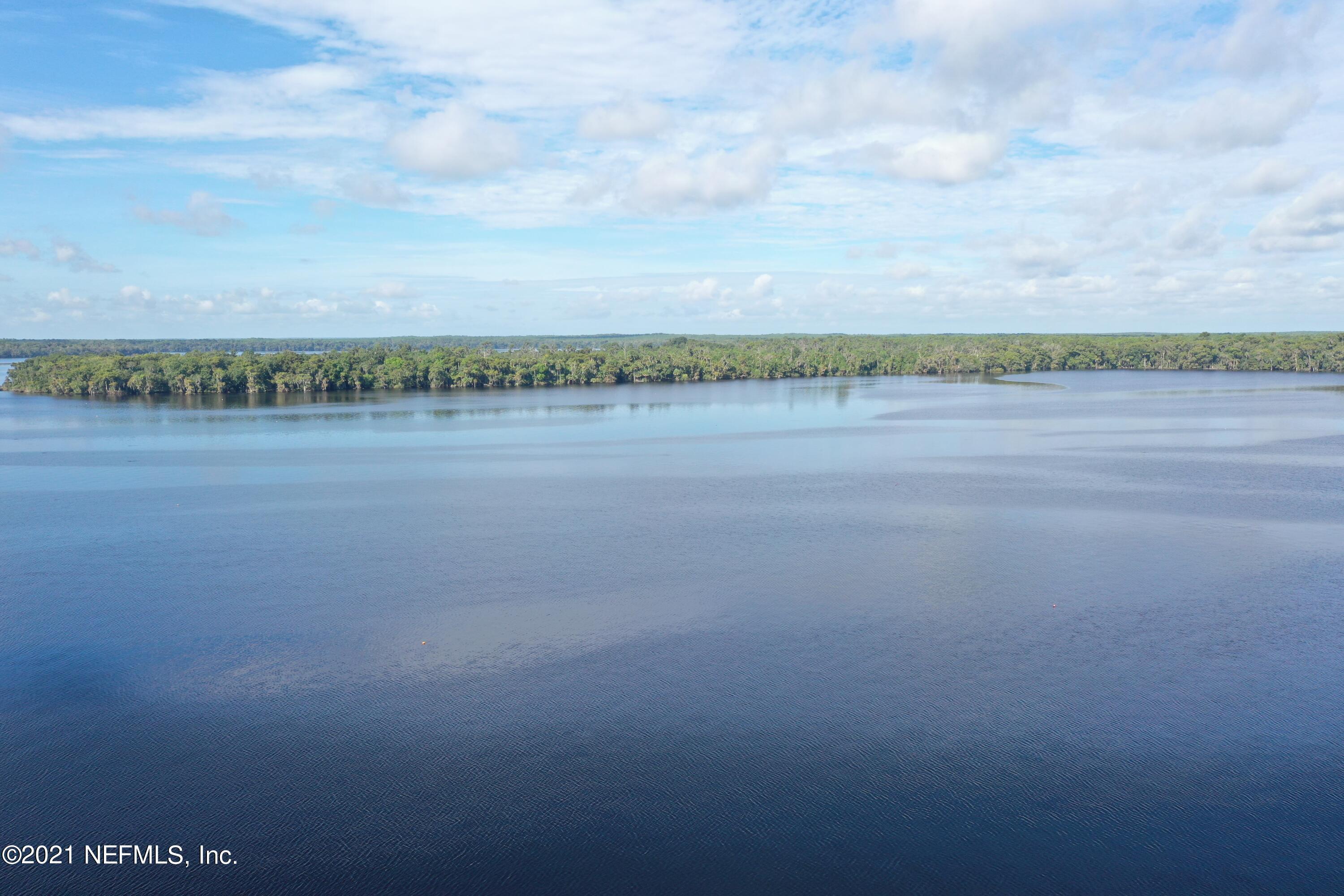 0 Wooten Rd Crescent Crescent City, FL 32112 - Photo 10 of 26 a view of an lake and a mountain