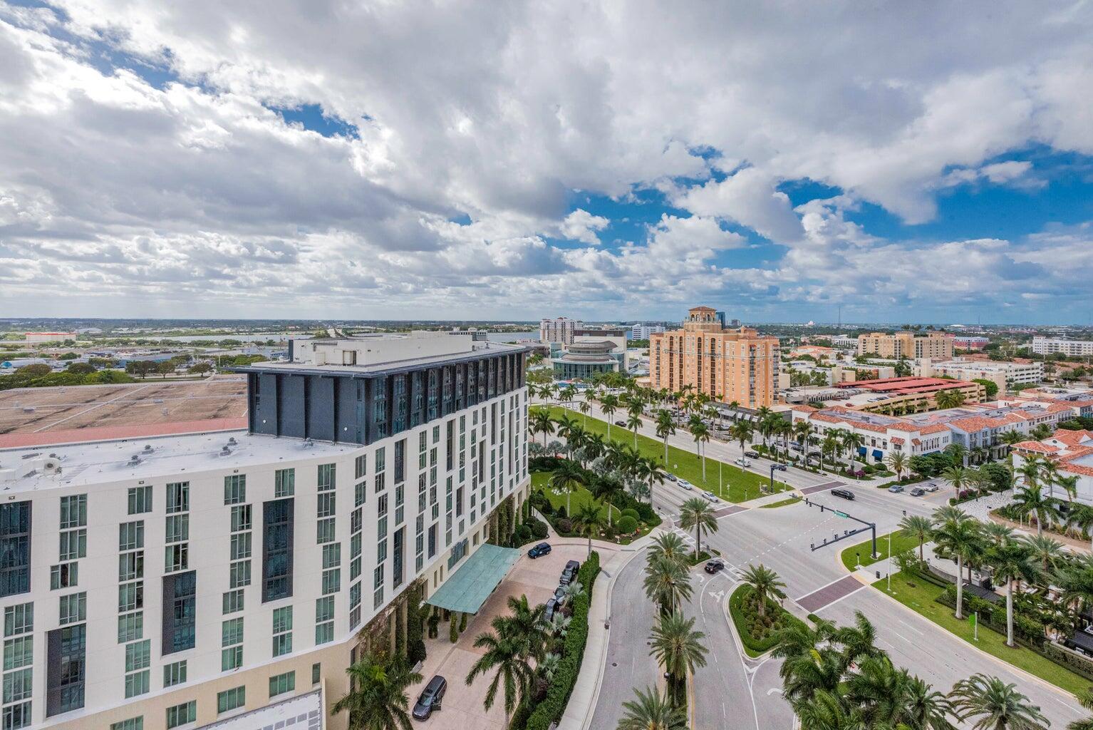 550 Okeechobee Boulevard, Unit 1718 West Palm Beach, FL 33401 - Photo 11 of 13 a view of a city with lots of trees