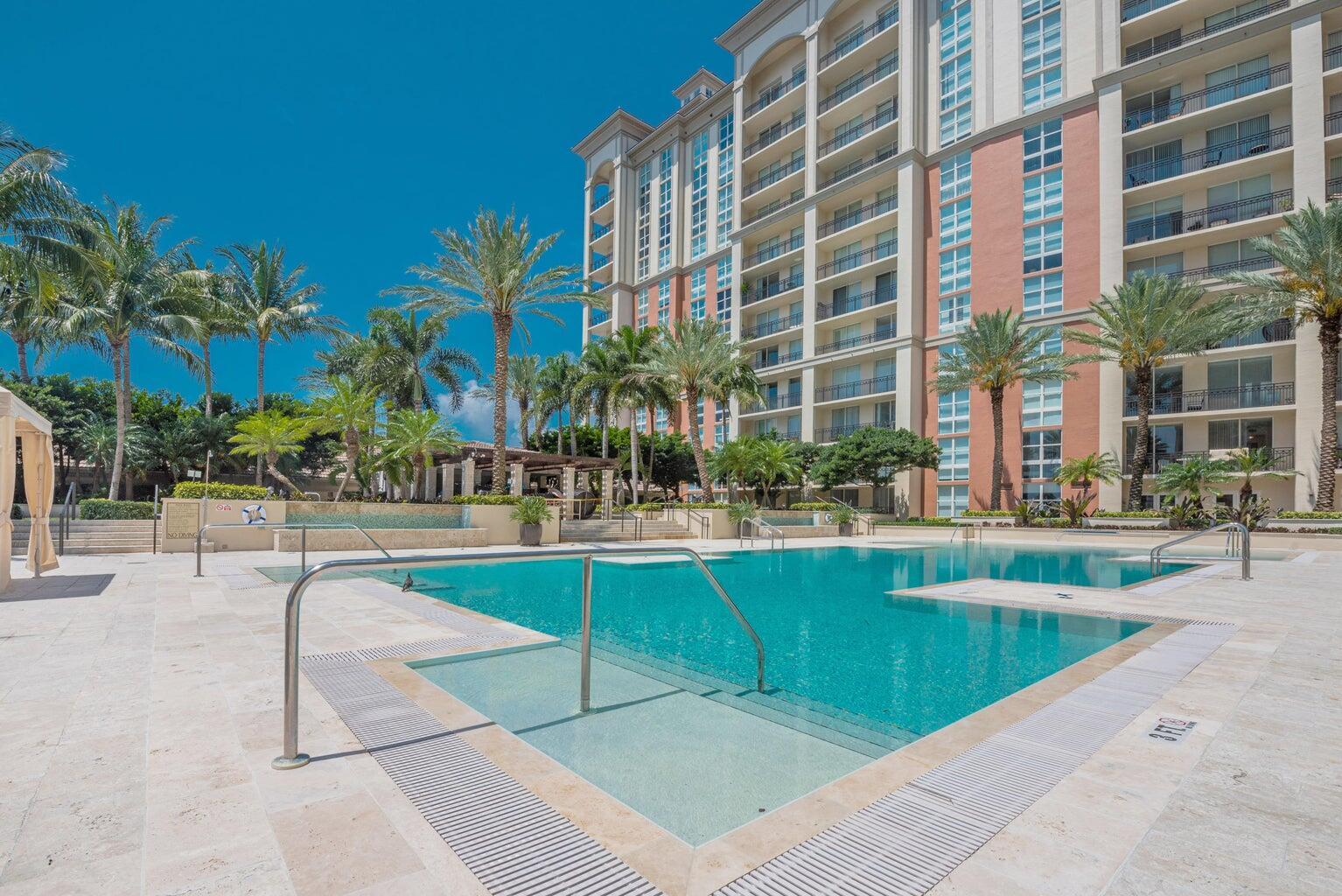 550 Okeechobee Boulevard, Unit 1718 West Palm Beach, FL 33401 - Photo 13 of 13 a view of swimming pool with outdoor seating