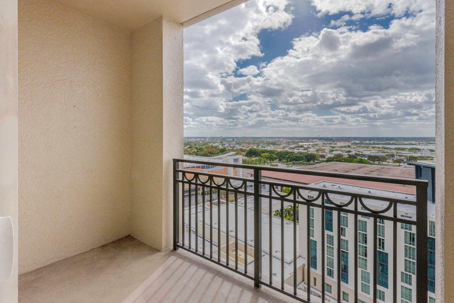 550 Okeechobee Boulevard, Unit 1718 West Palm Beach, FL 33401 - Photo 10 of 13 a view of balcony with wooden floor
