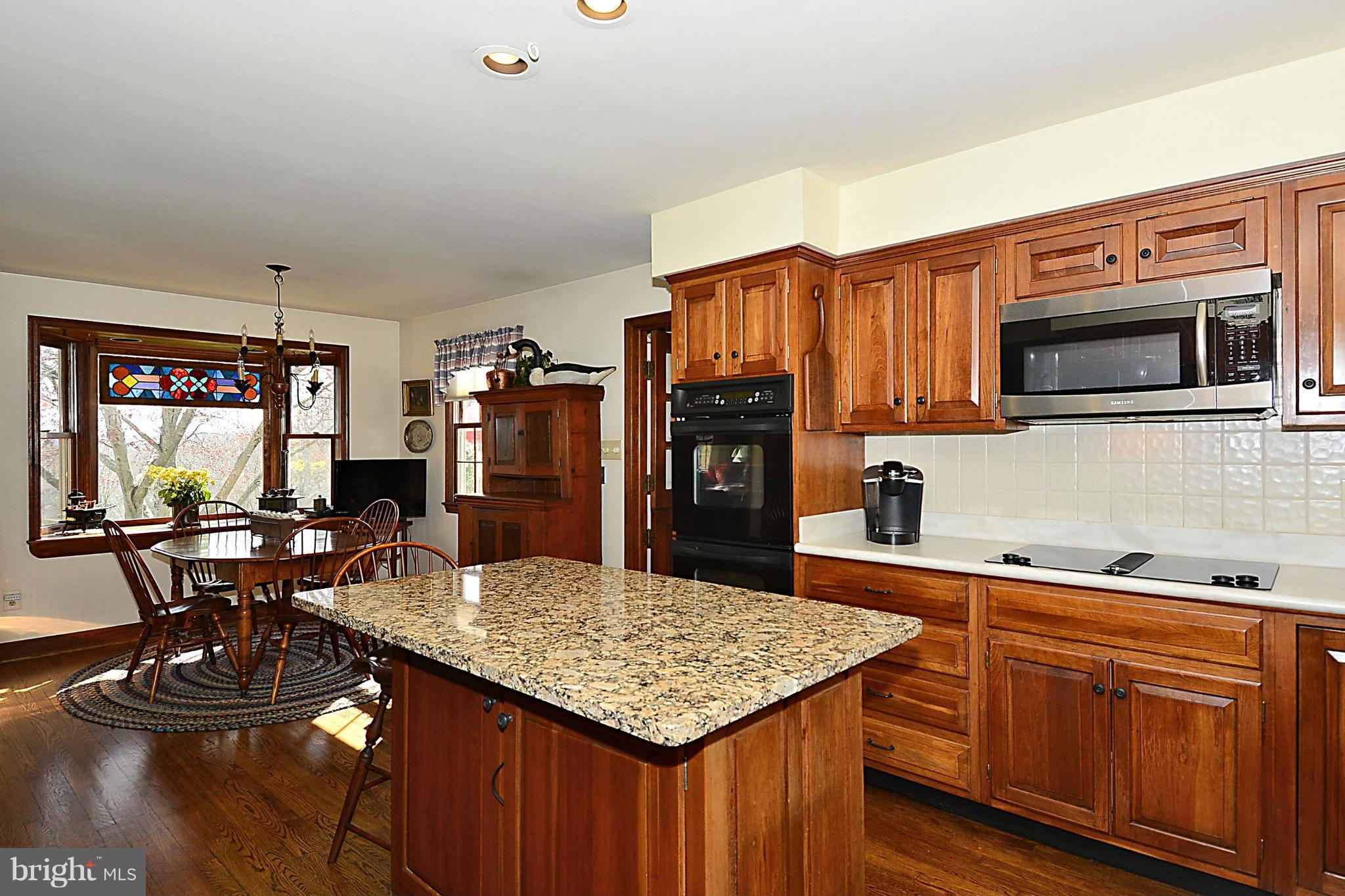 12514 Pennyfield Lock Road Potomac, MD 20854 - Photo 11 of 30 Corian and Granite Kitchen