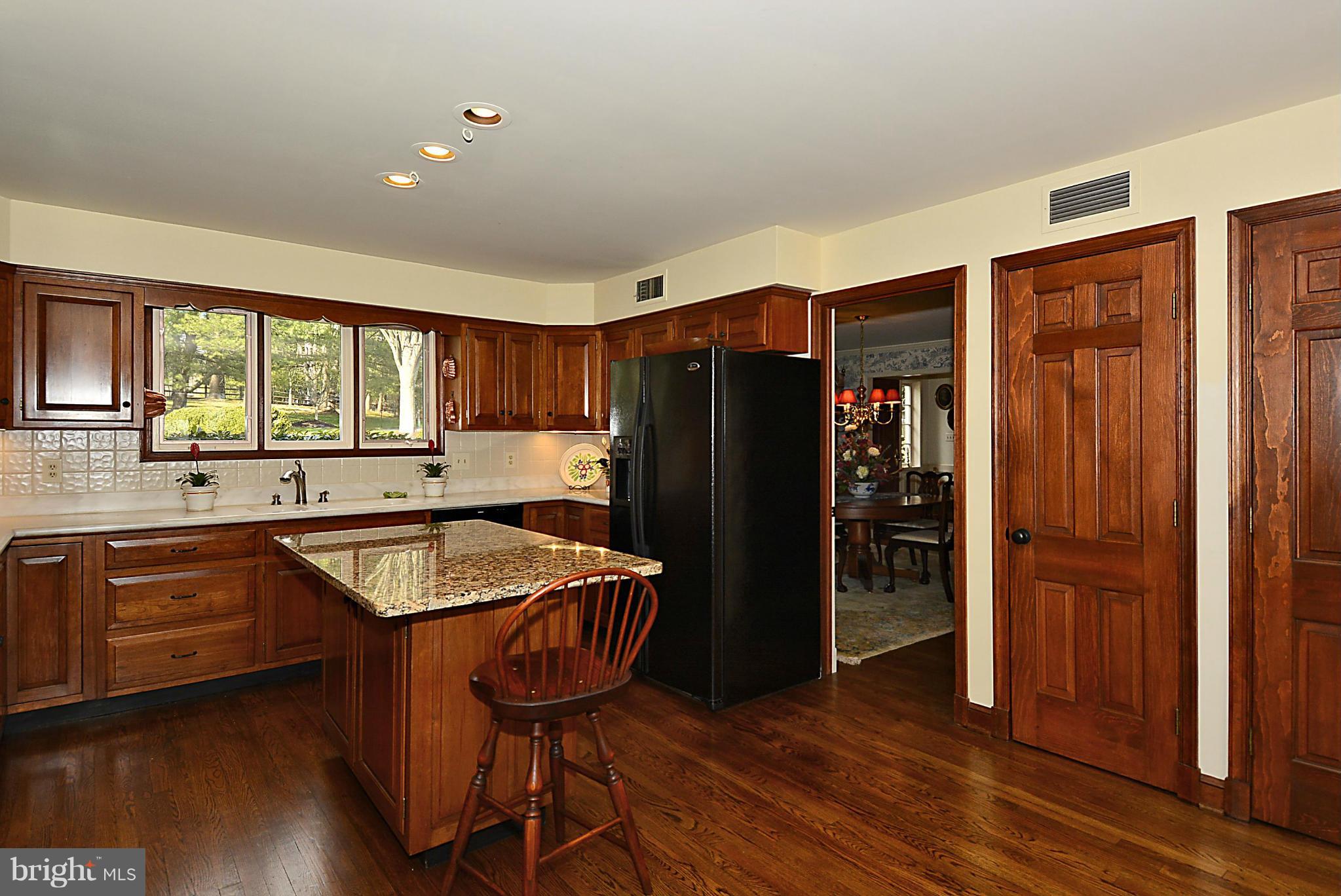 12514 Pennyfield Lock Road Potomac, MD 20854 - Photo 12 of 30 Gorgeous Kitchen with Granite Center Island