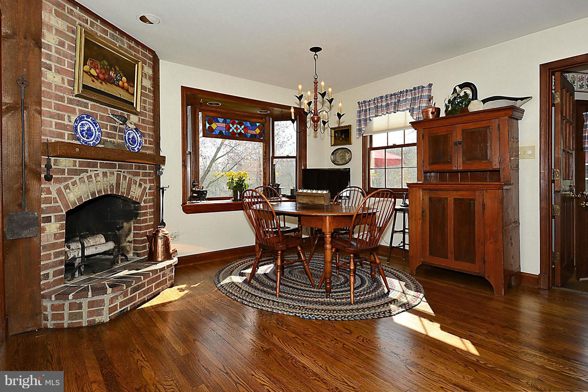 12514 Pennyfield Lock Road Potomac, MD 20854 - Photo 13 of 30 Breakfast Room with Fireplace