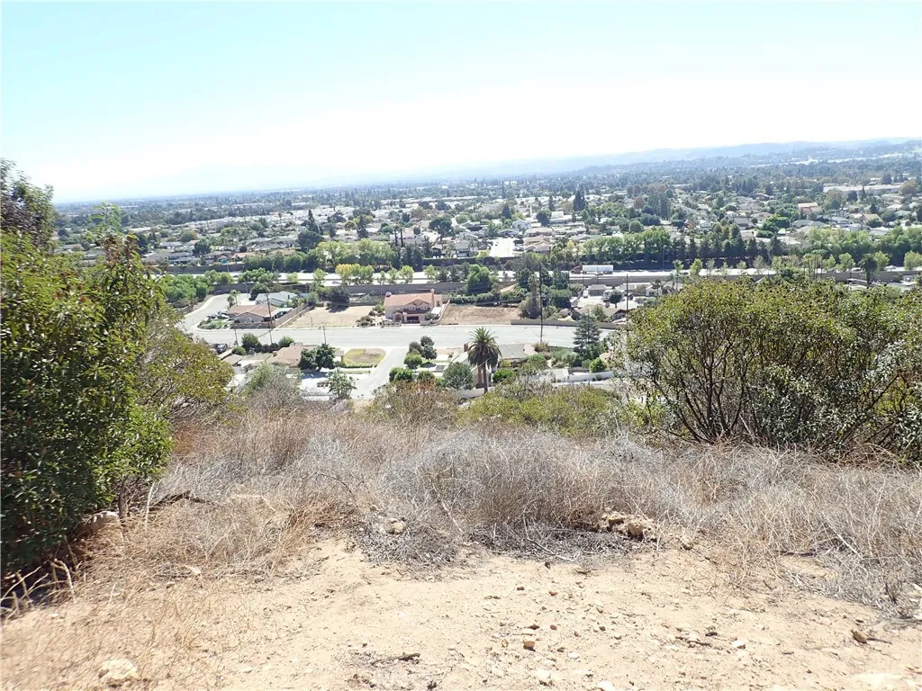 0 Broken Spur Road La Verne, CA 91750 - Photo 17 of 28 a view of a dry yard with wooden fence
