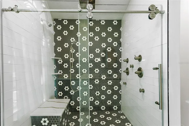a bathroom with a shower curtain