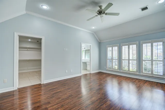 a bathroom with a tub and shower