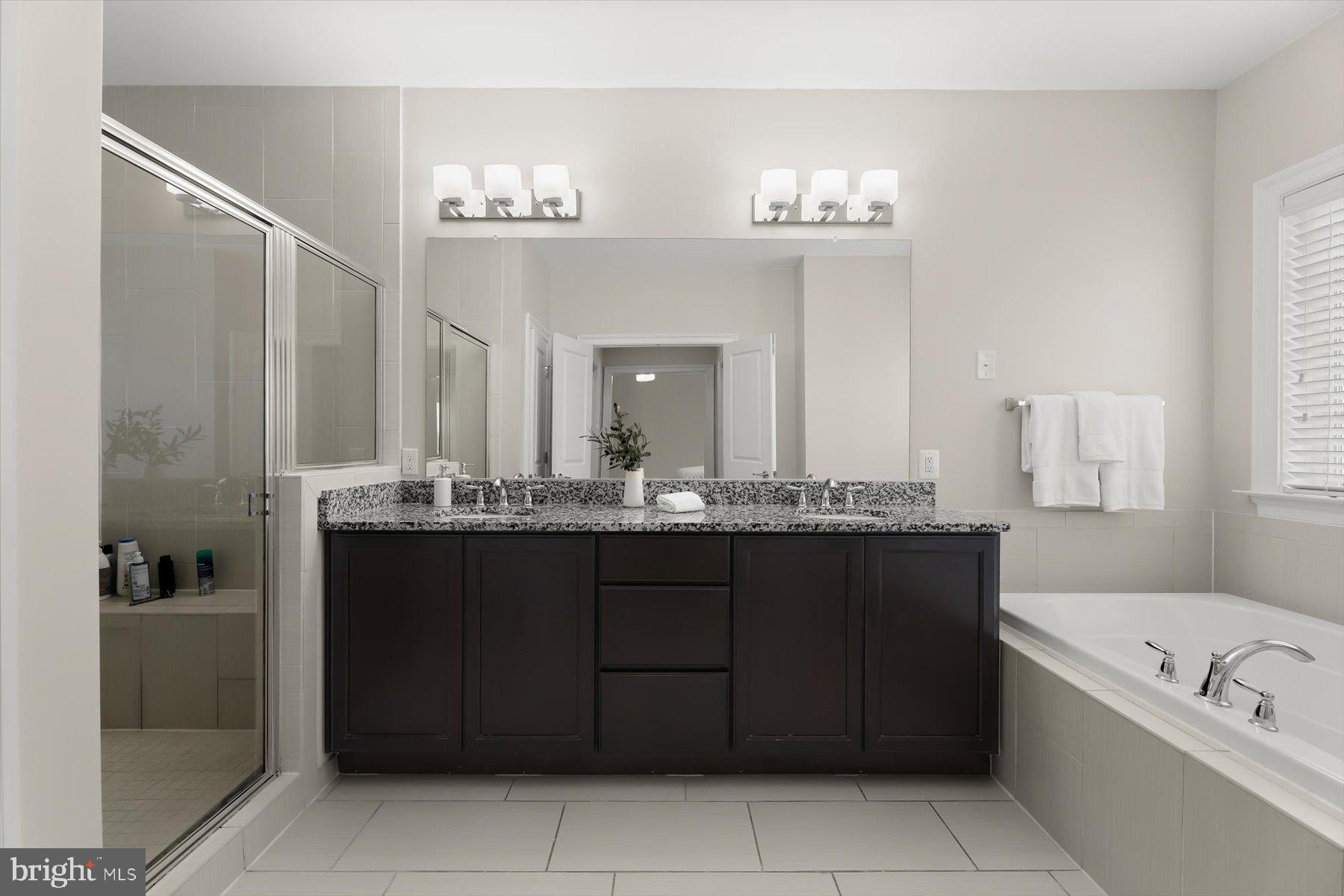 11613 Paca Street Fulton, MD 20759 - Photo 25 of 30 Sleek modern bathroom oasis.