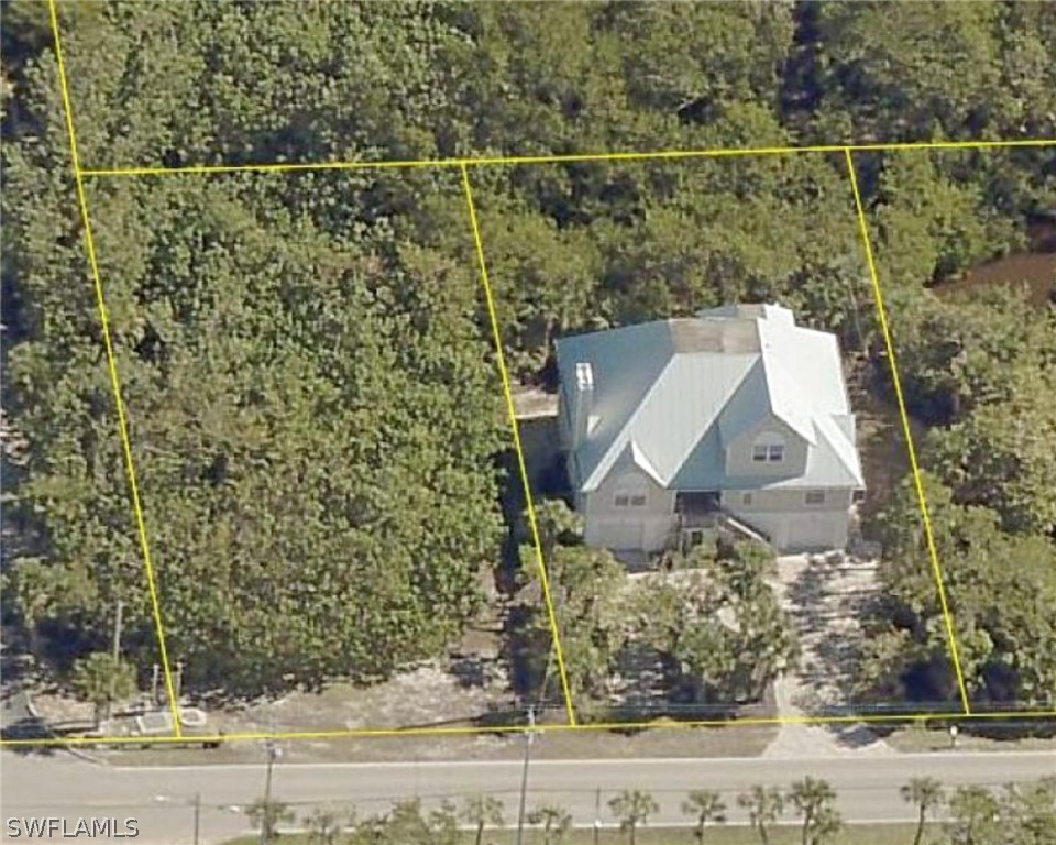 898 Rabbit Road Sanibel, FL 33957 - Photo 1 of 1 a aerial view of a house