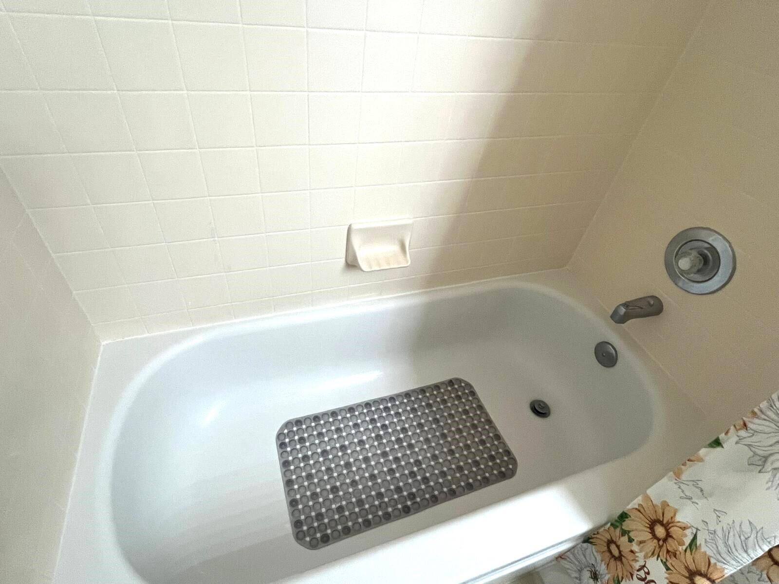 7 Amherst Court, Unit A Royal Palm Beach, FL 33411 - Photo 23 of 45 a bathroom with a bathtub and shower