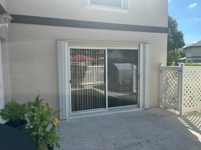 a view of a park with palm trees