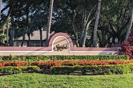 7 Amherst Court, Unit A Royal Palm Beach, FL 33411 - Photo 43 of 45 a view of statue in a garden