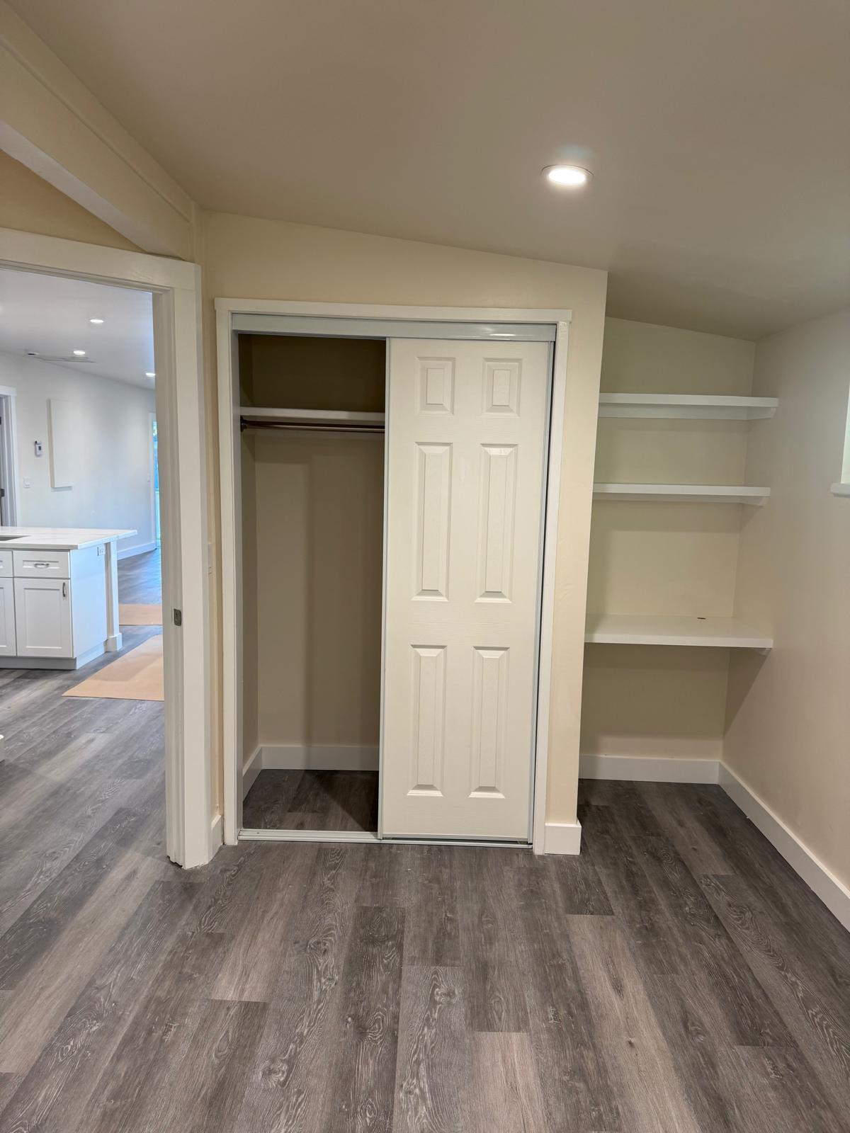 4946 8th Street, Unit B Carpinteria, CA 93013 - Photo 11 of 20 a view of an empty room and wooden floor