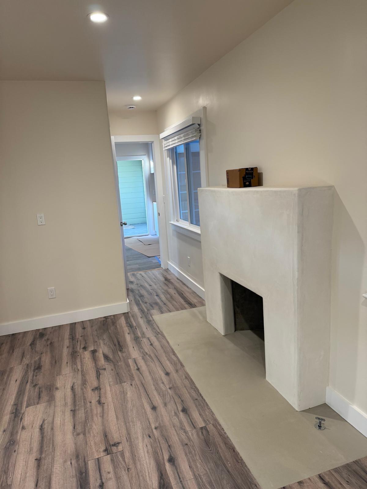4946 8th Street, Unit B Carpinteria, CA 93013 - Photo 5 of 20 a view of a livingroom with wooden floor and staircase