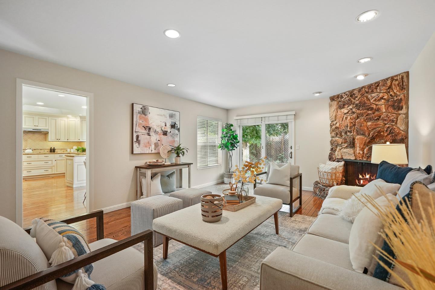 190 Pine Lane Los Altos, CA 94022 - Photo 13 of 26 a living room with furniture and a painting on the wall