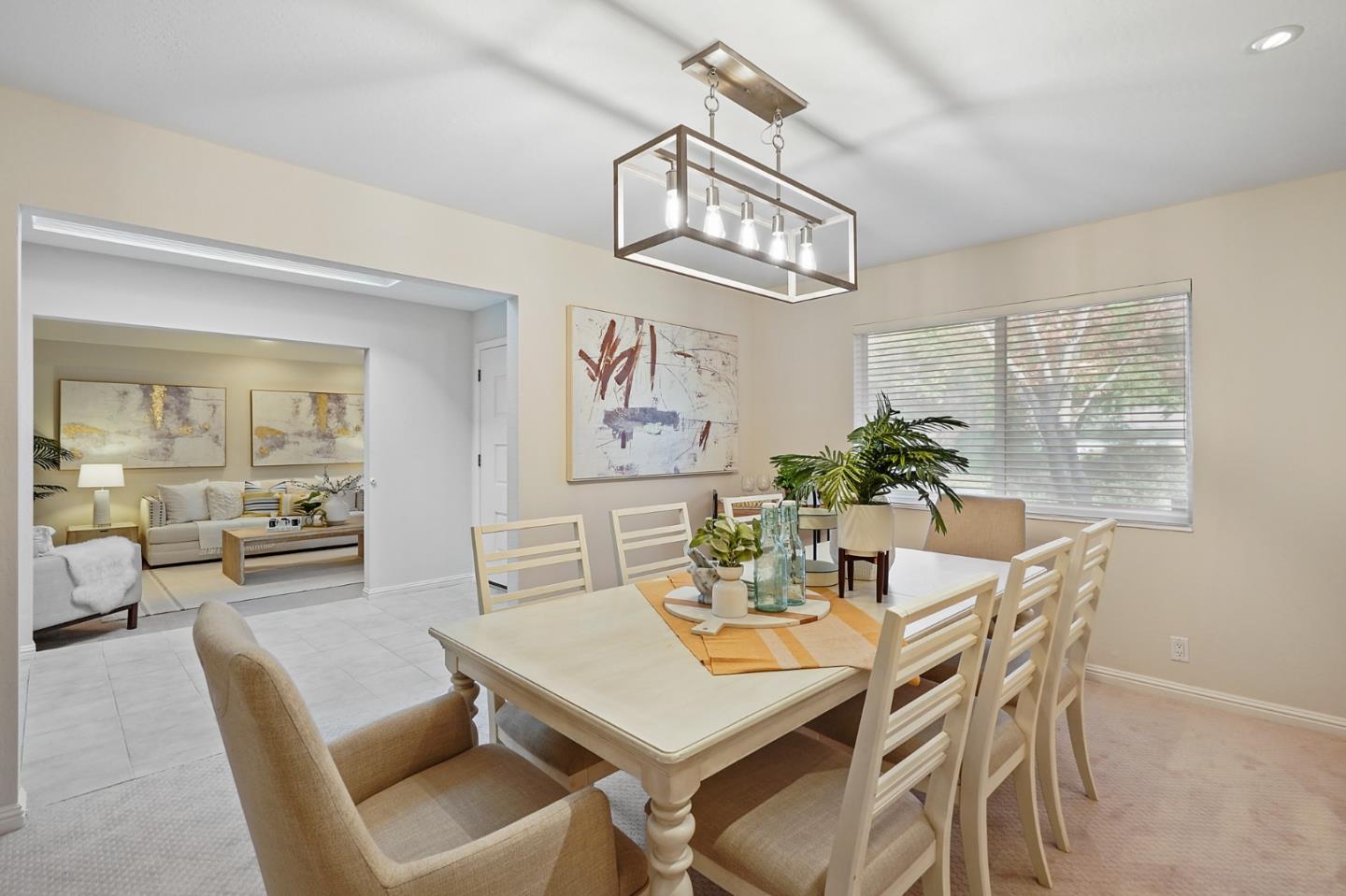 190 Pine Lane Los Altos, CA 94022 - Photo 5 of 26 a view of a dining room with furniture wooden floor and a chandelier