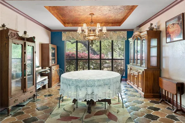a kitchen with stainless steel appliances granite countertop a sink a counter space and cabinets