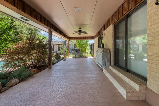 a view of a swimming pool from a balcony