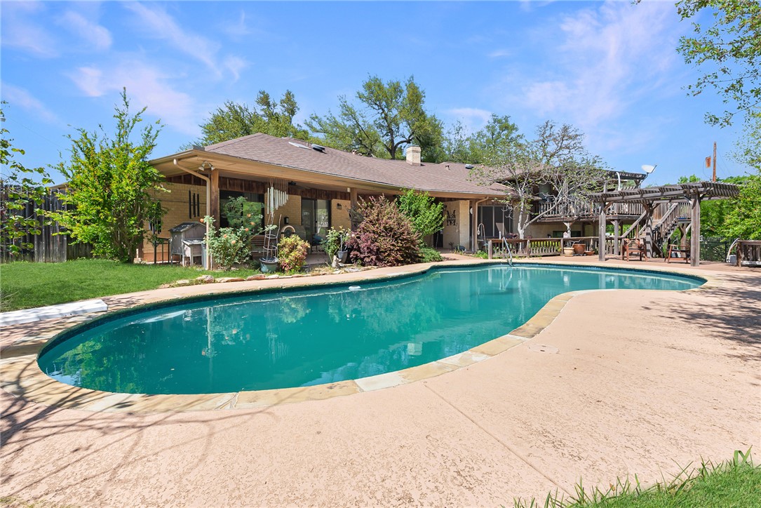 1309 Rock Dam Road Marlin, TX 76661 - Photo 35 of 50 Pool with a patio area, fence, and a lawn