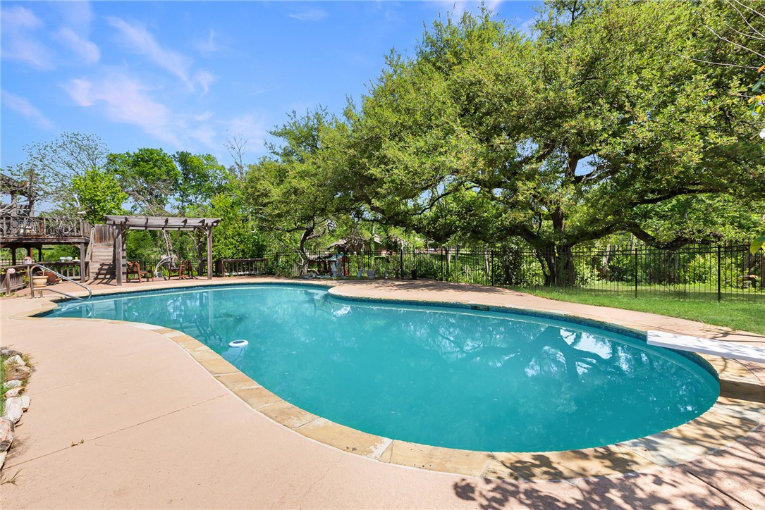 1309 Rock Dam Road Marlin, TX 76661 - Photo 36 of 50 View of swimming pool featuring a pergola, a patio, a fenced backyard, and a fenced in pool